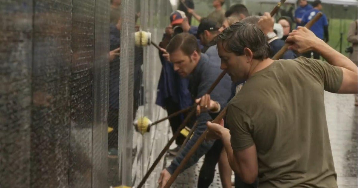 Congressmen clean Vietnam memorial to honor fallen