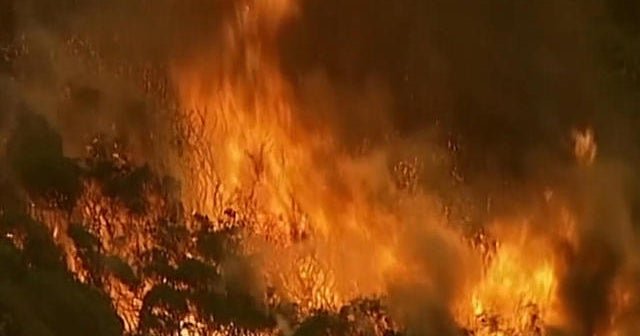 Australian sky turns apocalyptic red by raging wildfires