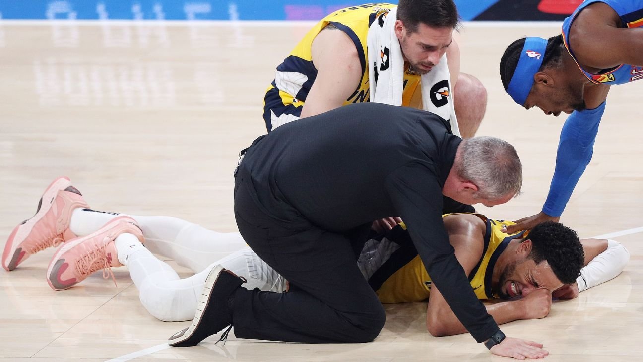 Emotional Haliburton helped off with leg injury
