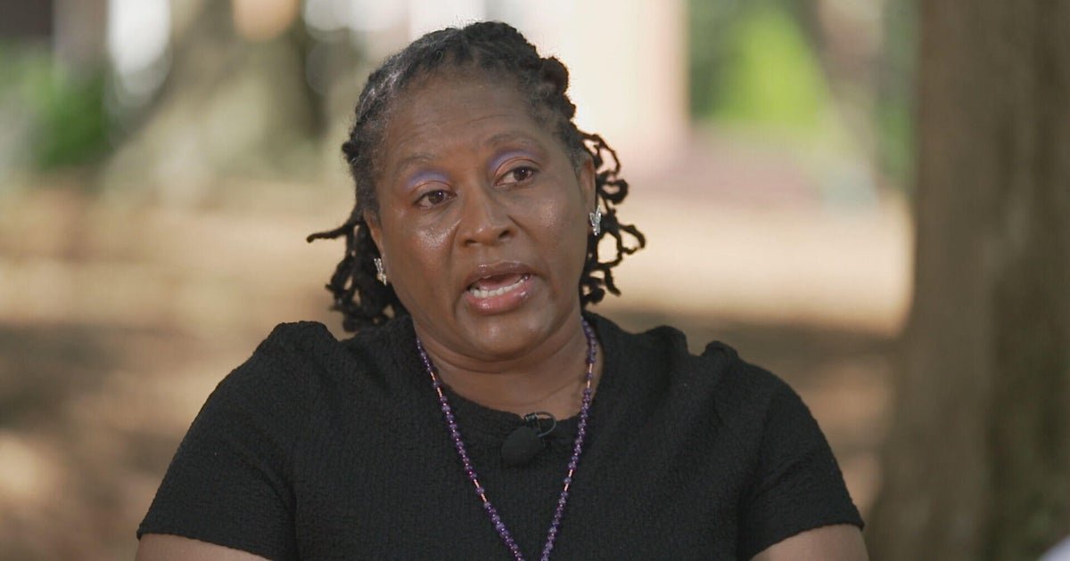 She says she killed her husband after years of enduring his abuse. A new Georgia law could reduce her sentence.